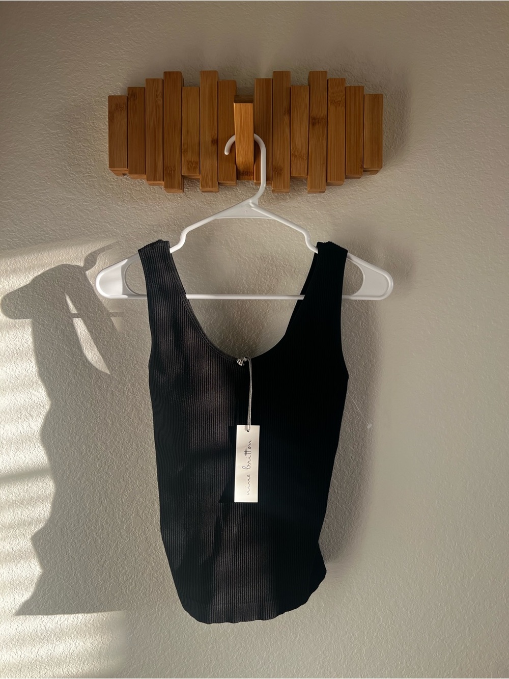 nine britton Black Ribbed Scoop Bodysuit